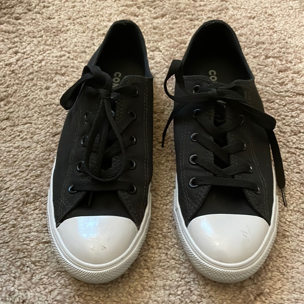 Women’s low top solid black canvas Converse, size 8.5